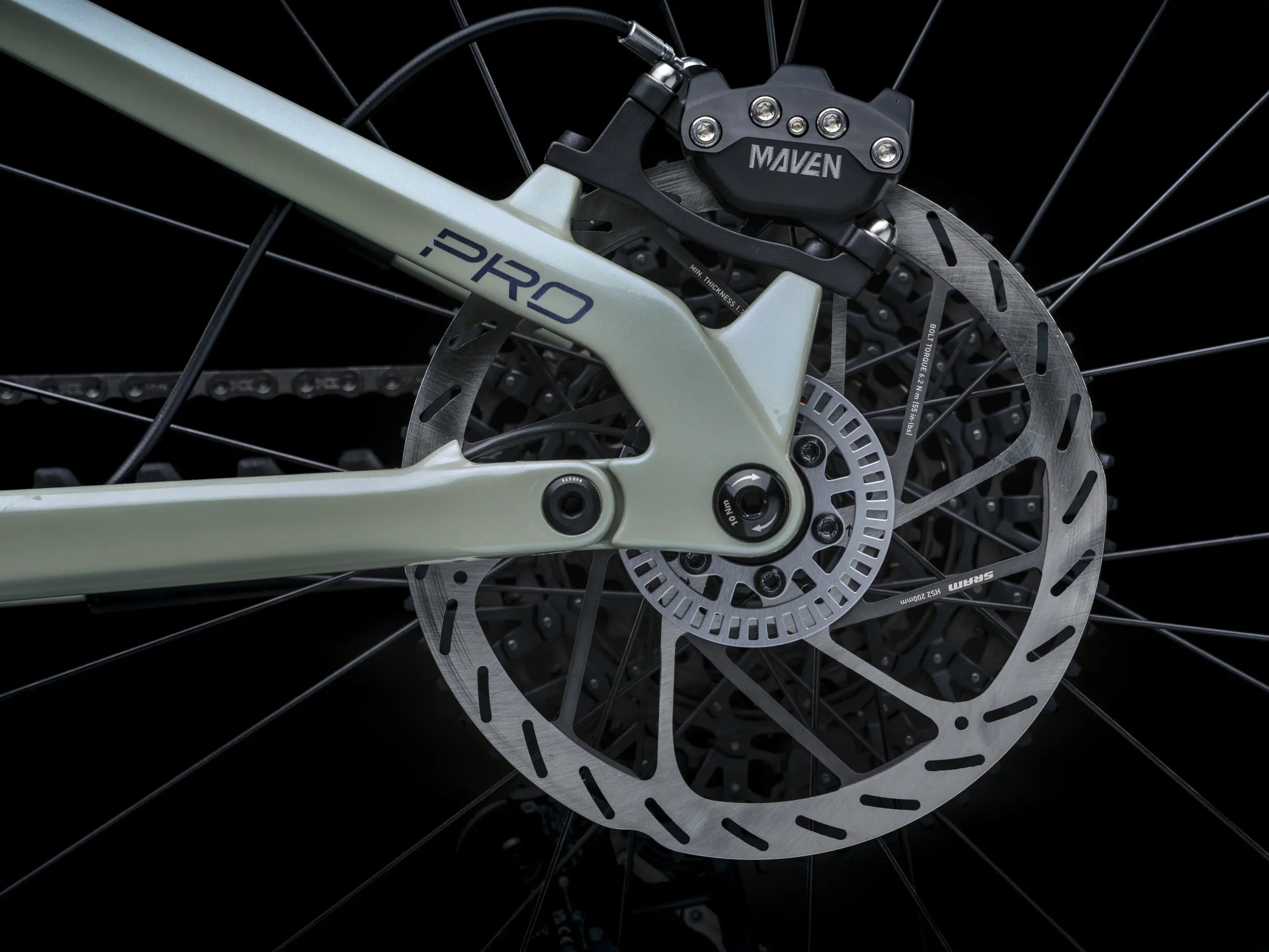 Close-up of Crussis e-Full 12.11-PRO wheel with disc brake and 'Maven' branding on a black background