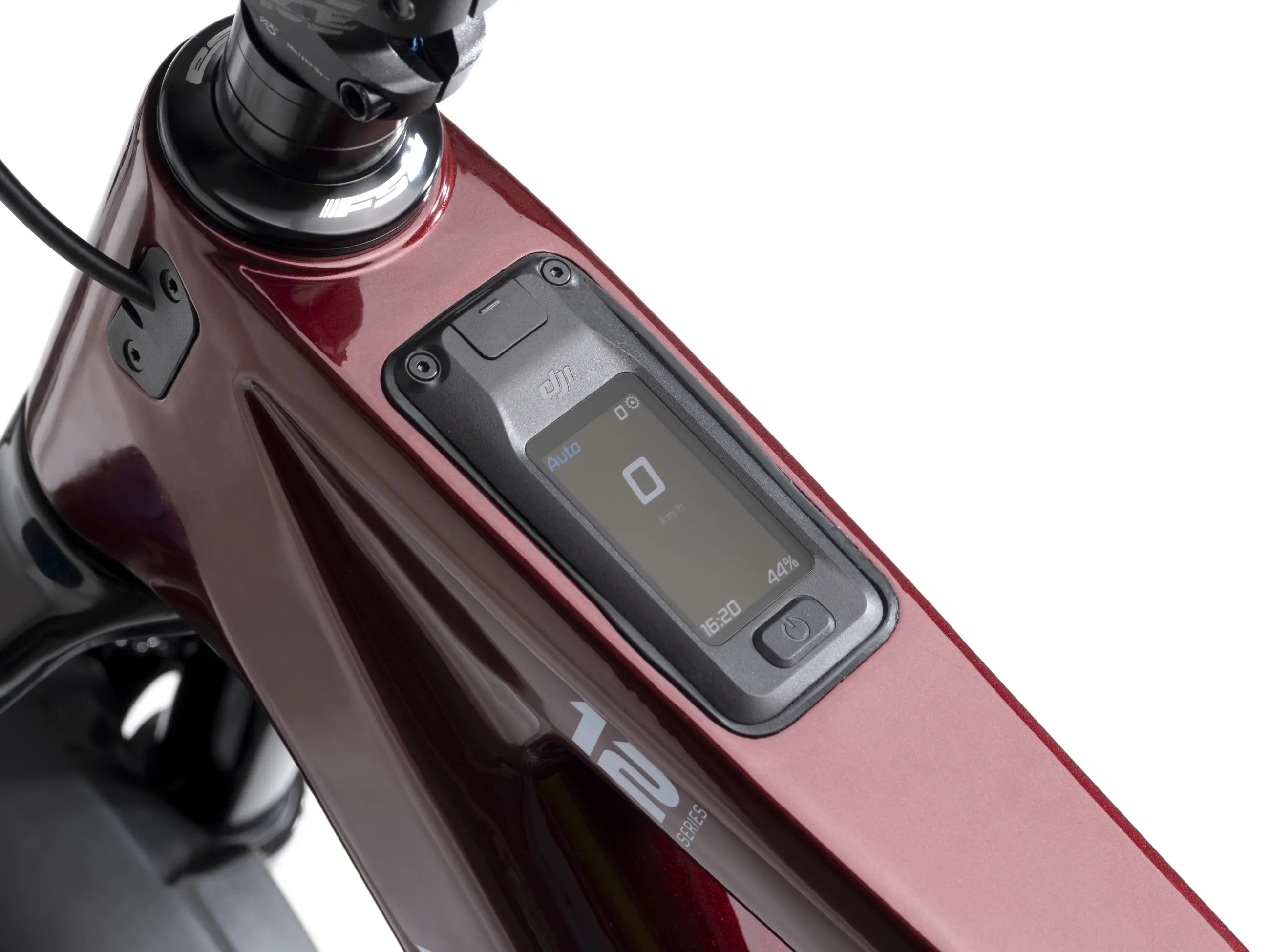 Close-up of Crussis e-Full 12.11 E-MTB with display in top tube on a white background