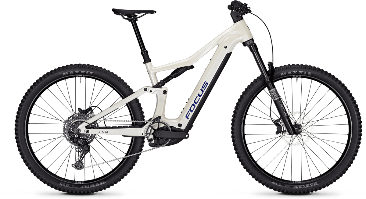 A Focus full-suspension mountain bike with a white frame, black suspension components, and black knobby tires, shown from a side profile on a white background.