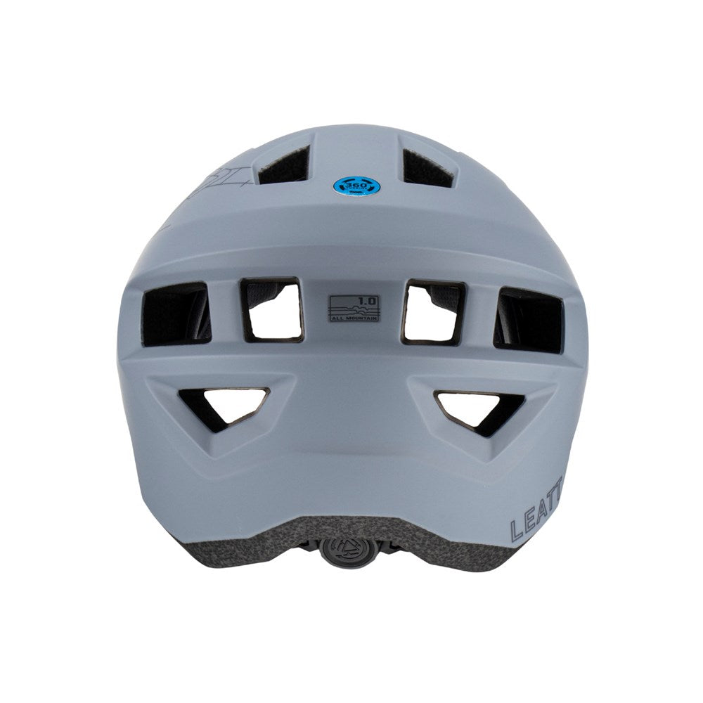 Gray Leatt helmet with black vents on a white background