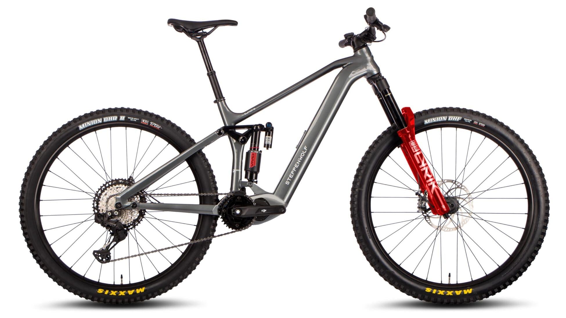 A full-suspension electric mountain bike in matte gray with a bright red front fork, black tires, and a black saddle, shown from a side profile on a white background.
