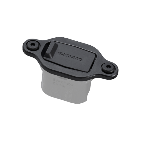 A black Shimano satellite charging port for a bicycle's motor system.
