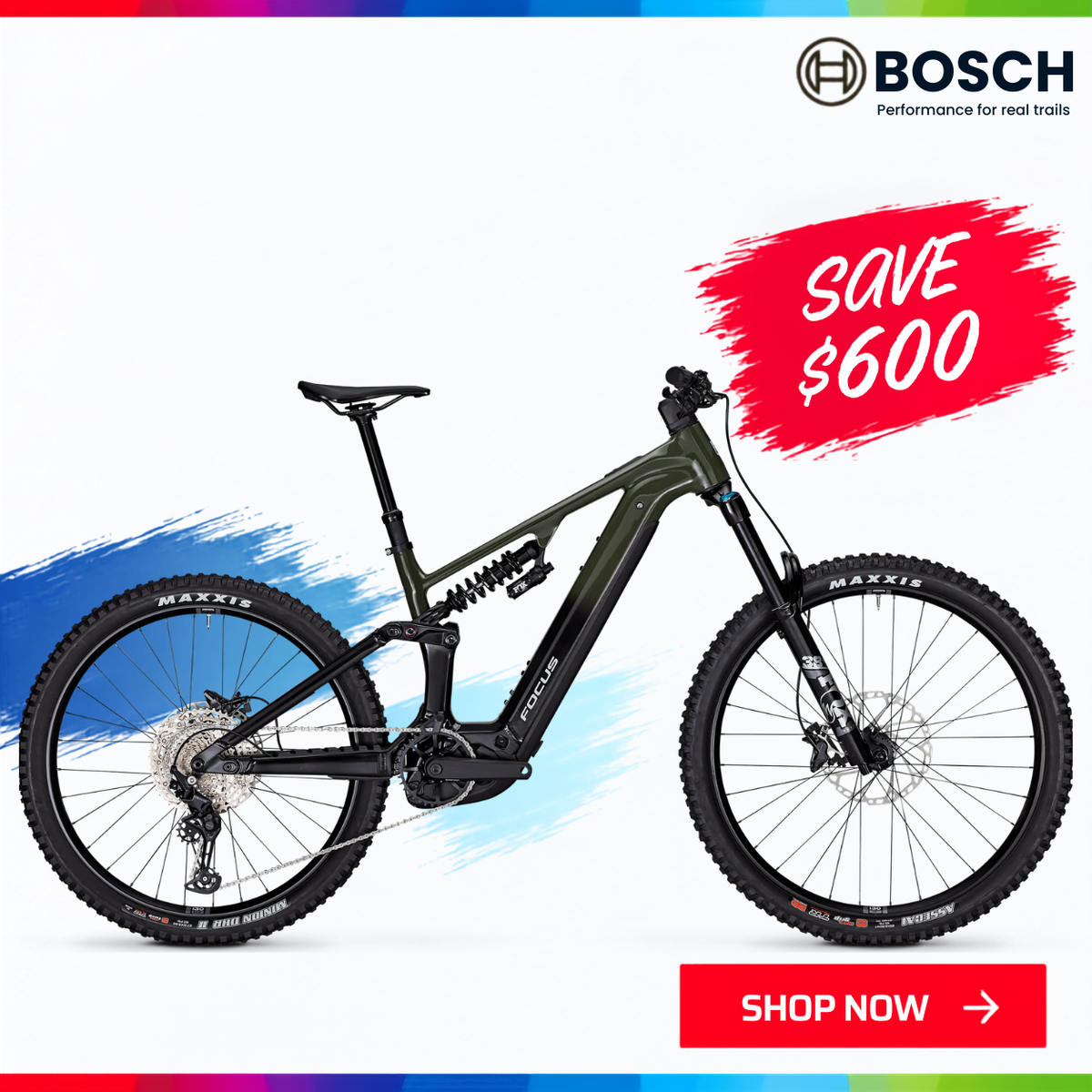 The Focus JAM 6.8 full-suspension electric mountain bike with a white frame and black components. 'SAVE $600' and 'SHOP NOW' with the Spring into Action sale