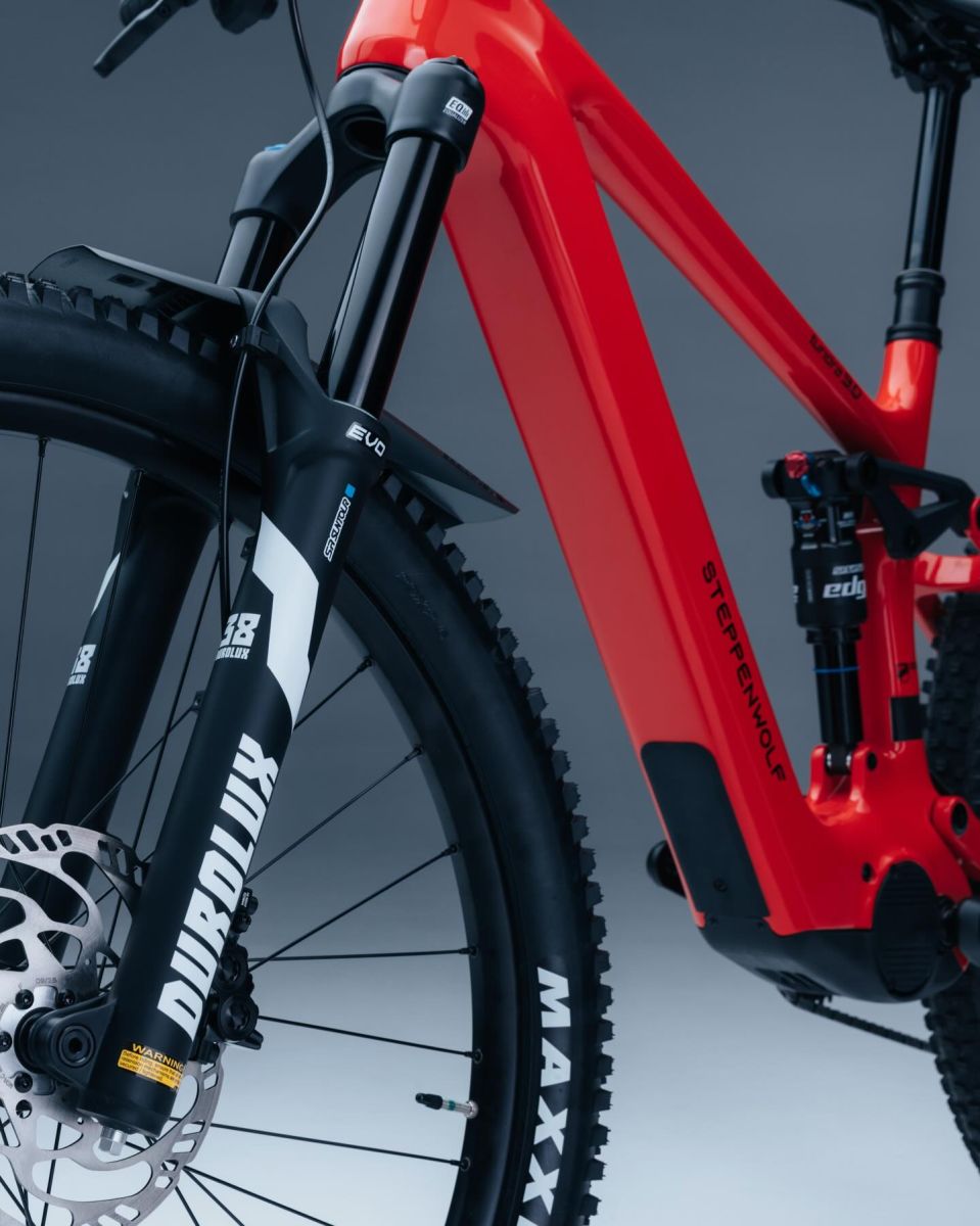 Close-up studio shot of Steppenwolf Tundra in red mountain bike frame