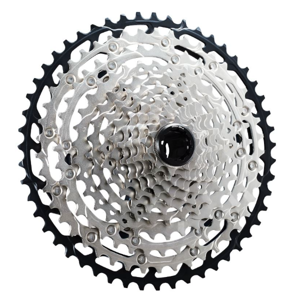 A Shimano SLX M7100 12-speed mountain bike cassette with a silver finish and intricate gear design.
