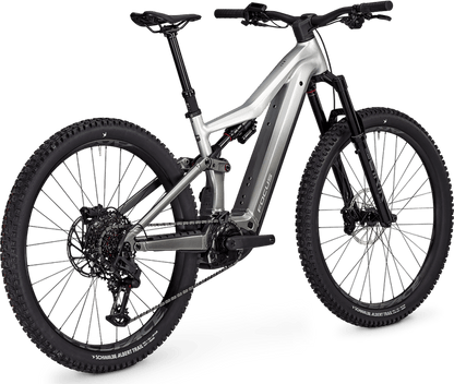 Silver Focus JAM² 6.8 electric bike on a black stand with a transparent background