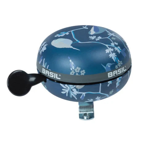 Blue Basil bicycle bell with floral design and Basil branding on a white background