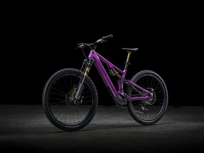Purple Crussis e-Full 12.11 Pro X E-MTB on a black background