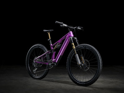 Purple Crussis e-Full 12.11 Pro X E-MTB on a black background