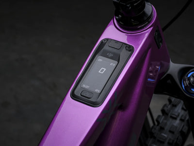Close-up of Crussis e-Full 12.11 Pro X E-MTB with control panel on a dark background