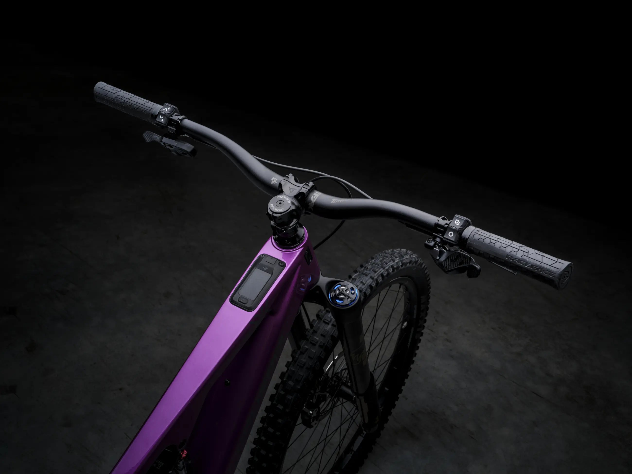 Crussis e-Full 12.11 Pro X E-MTB with digital display on a dark background