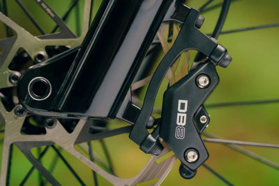 Close-up of a Aventon Current bicycle brake mechanism from DB8