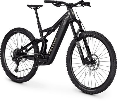 A black Focus full-suspension mountain bike with a black battery pack and gold Focus branding, shown on a clean white background.