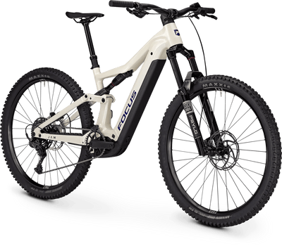 A Focus full-suspension mountain bike with an off-white frame and black components, including tires, fork, and seatpost, shown on a clean white background.