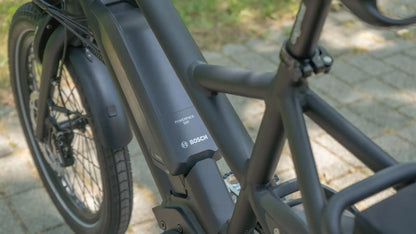 Close-up of Gepida Cargo City E-Bike with Bosch electric bike motor on a blurred background