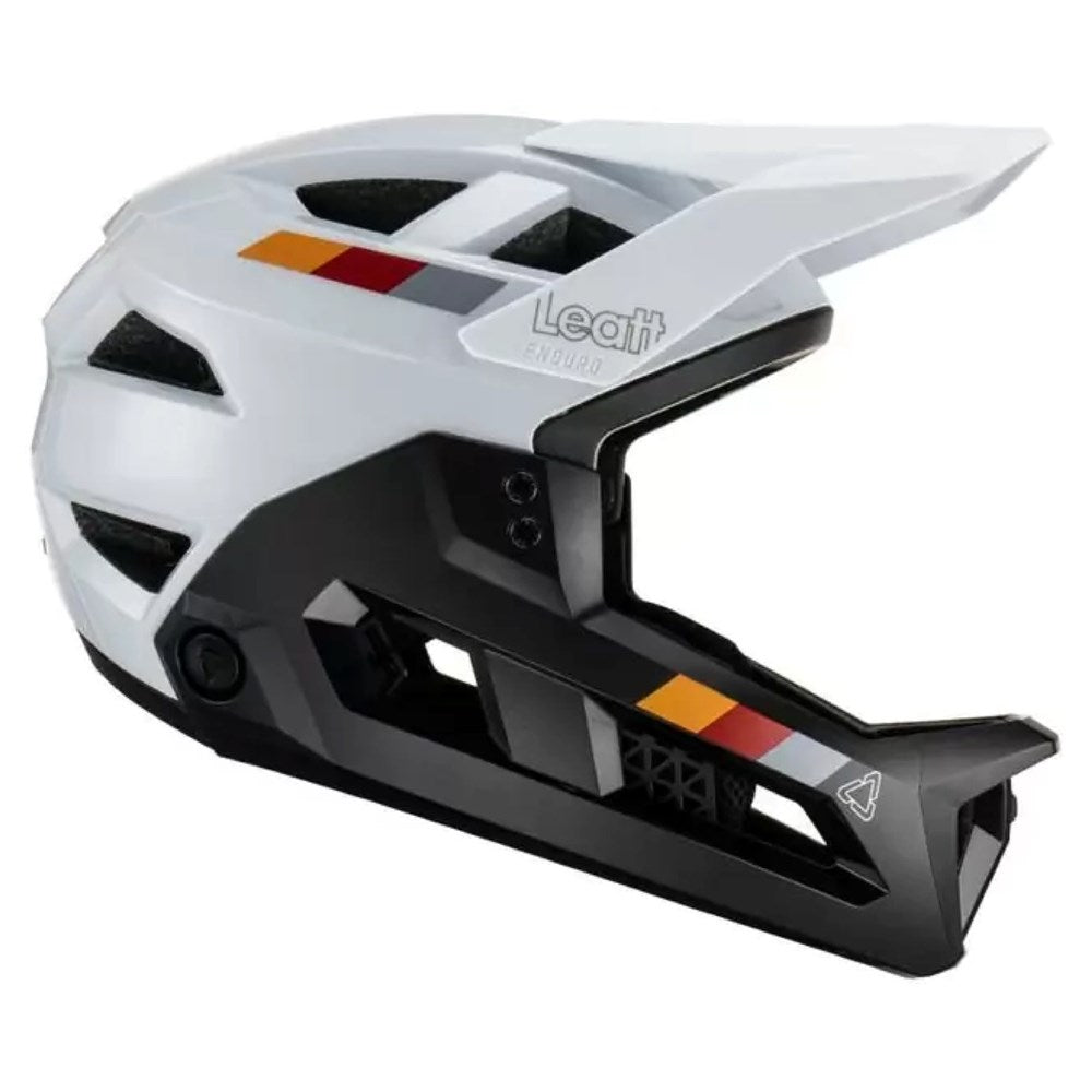 White and black helmet with Leatt logo on a white background