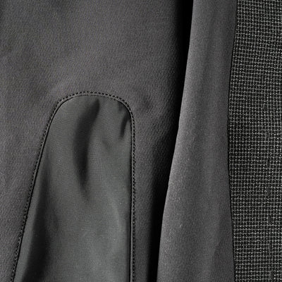 Close-up of a dark gray fabric with textured pattern- Leatt MTB Gravity 3.0 Women