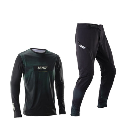 Leatt clothing set with shirt and pants on a white background