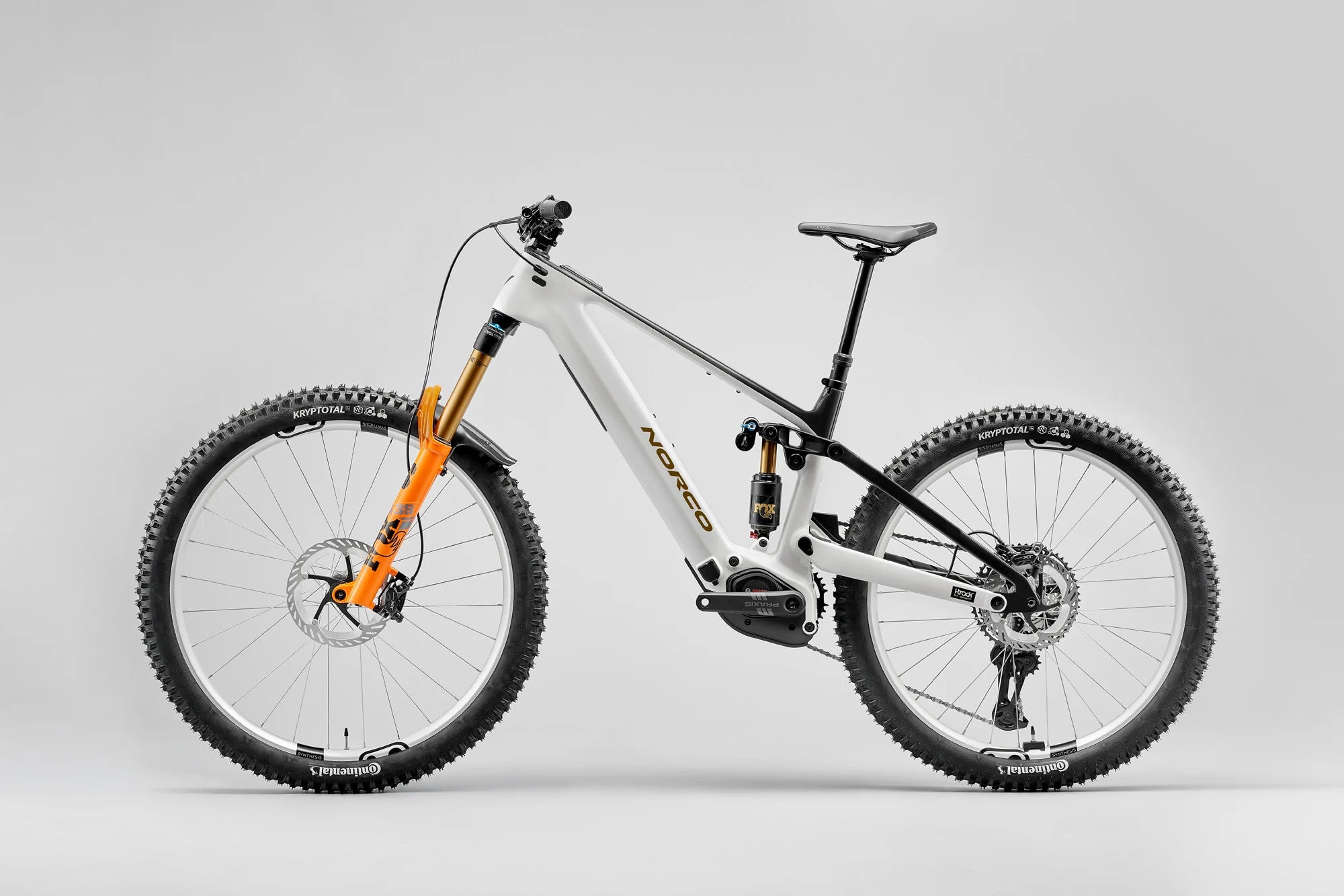 Mountain bike with orange accents on a gray background