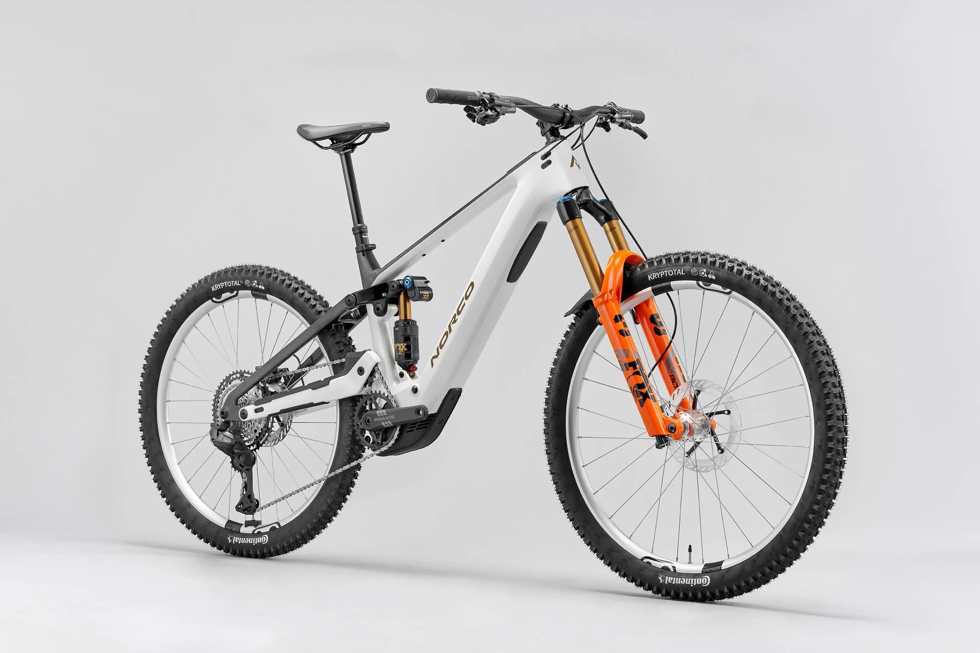 White mountain bike with orange suspension fork on a gray background