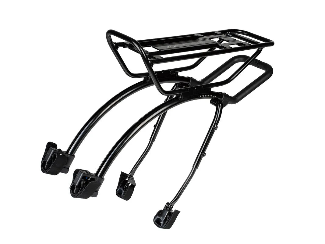 Black metal bike rack on a white background