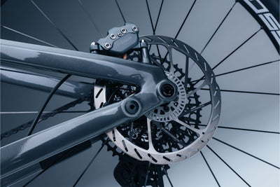 Close-up of Sram Maven disc brake system with a blurred background