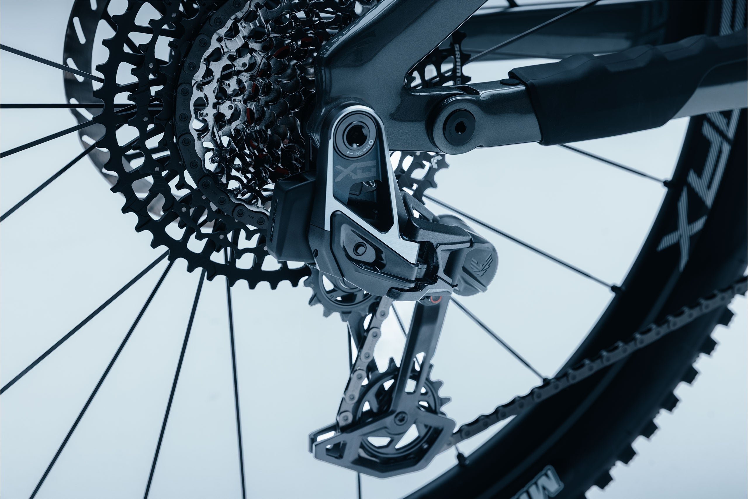 Close-up of SRAM X0 gear system with a blurred background on the Tundra 10