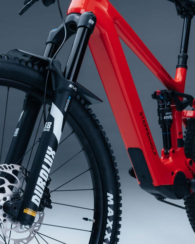 Close-up studio shot of Steppenwolf Tundra in red mountain bike frame