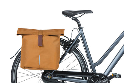 BASIL - CITY DOUBLE BAG in camo brown on bike